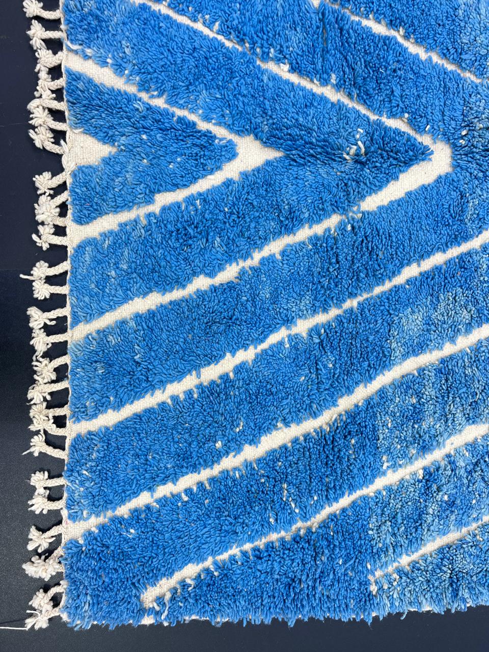 Blue Moroccan runner rug with carved ivory geometric lines, handmade wool