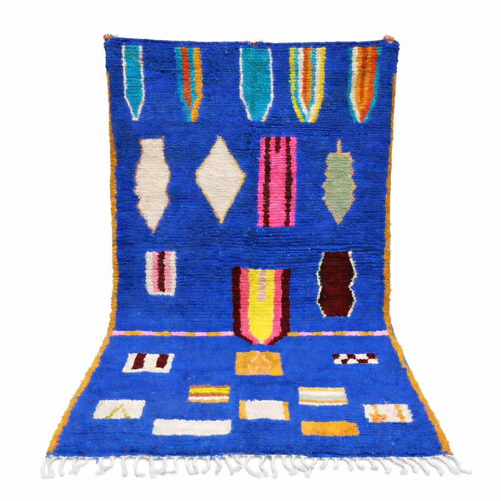 Blue Moroccan wool rug with modern abstract Berber symbols on a plush handwoven surface