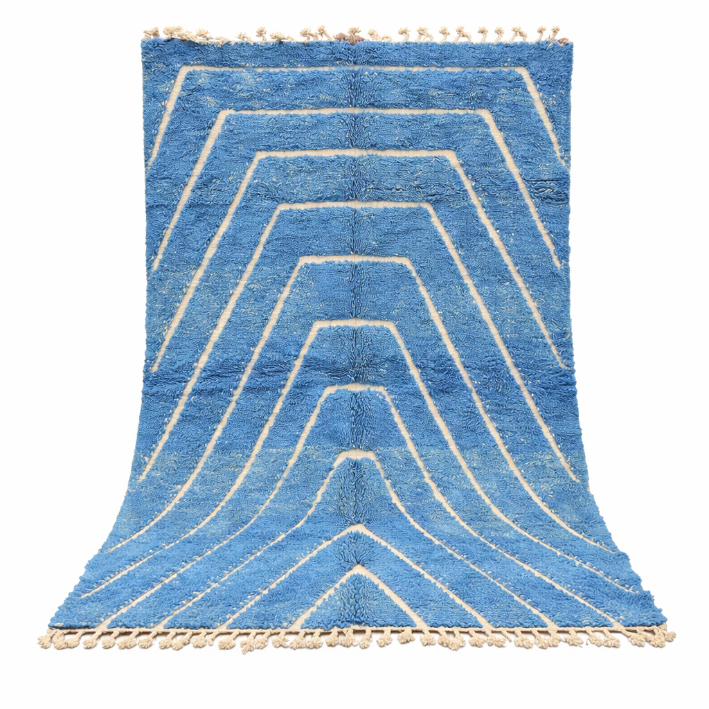 Blue Moroccan wool rug with carved geometric Berber lines, handmade in Morocco