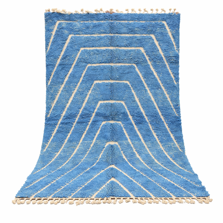 Blue Moroccan wool rug with carved geometric Berber lines, handmade in Morocco