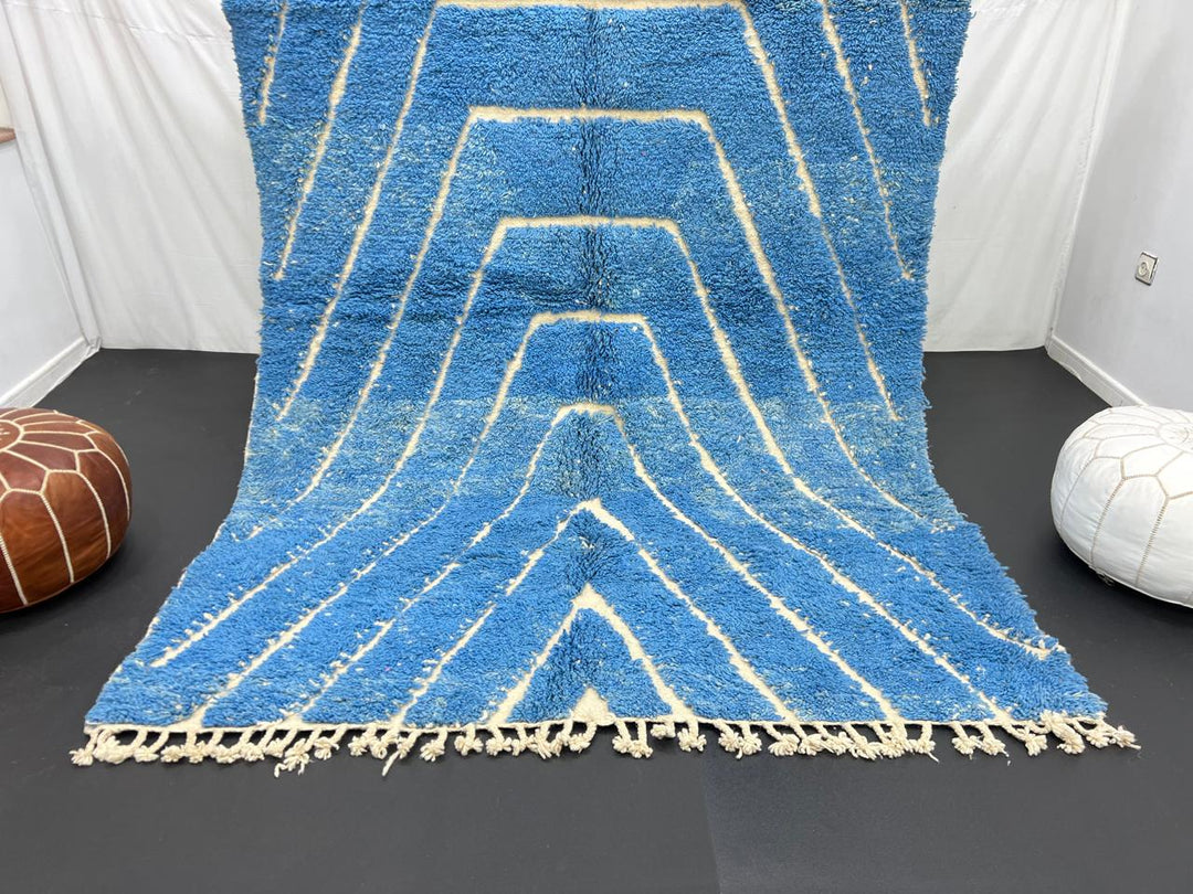 Blue Moroccan wool rug with carved geometric Berber lines, handmade in Morocco