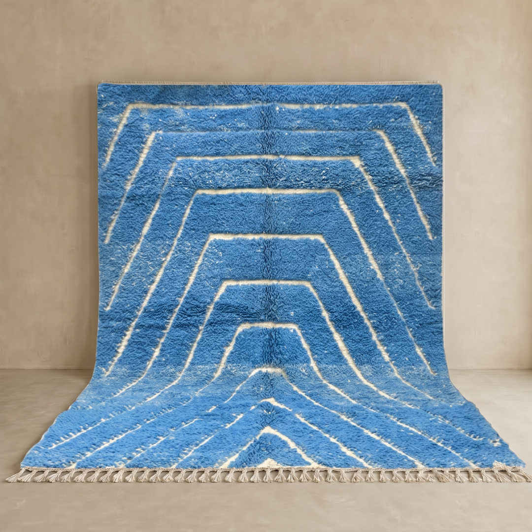 Blue Moroccan wool rug with carved geometric Berber lines, handmade in Morocco
