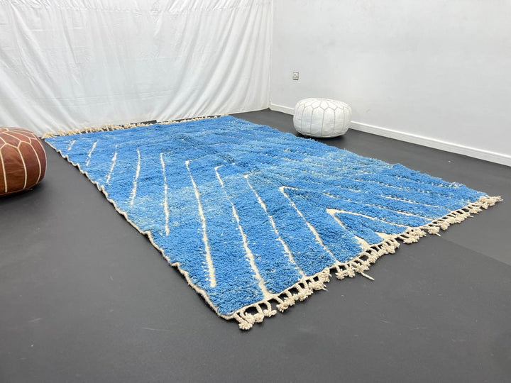 Blue Moroccan wool rug with carved geometric Berber lines, handmade in Morocco