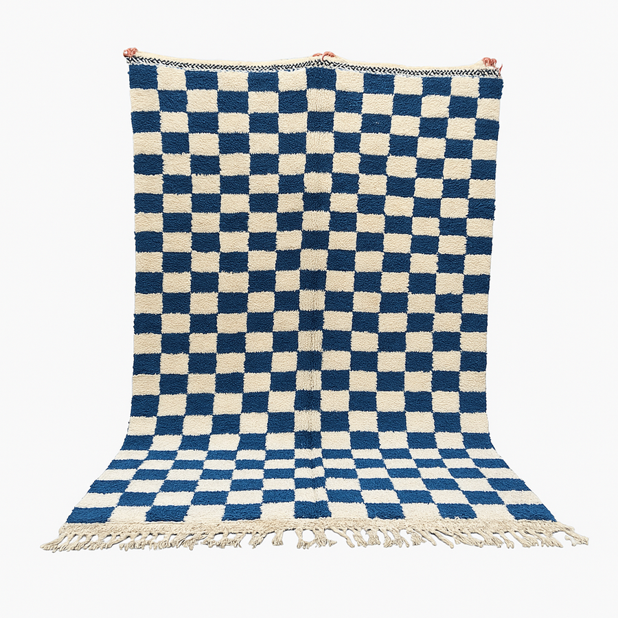 Handwoven blue and white Moroccan wool rug with checkerboard pattern