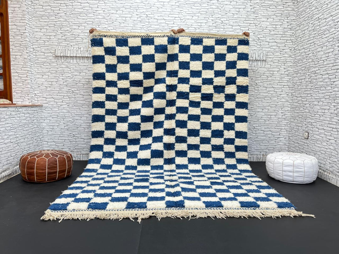 Handwoven blue and white Moroccan wool rug with checkerboard pattern