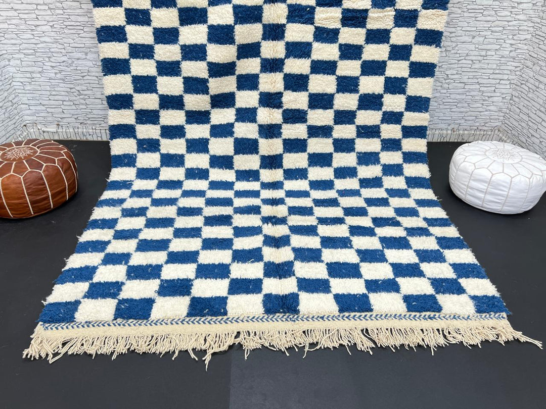 Handwoven blue and white Moroccan wool rug with checkerboard pattern