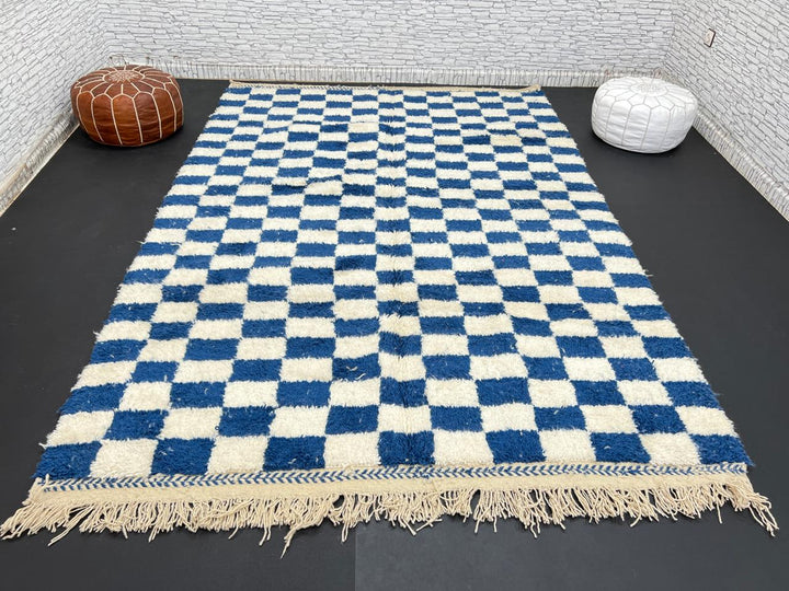 Handwoven blue and white Moroccan wool rug with checkerboard pattern