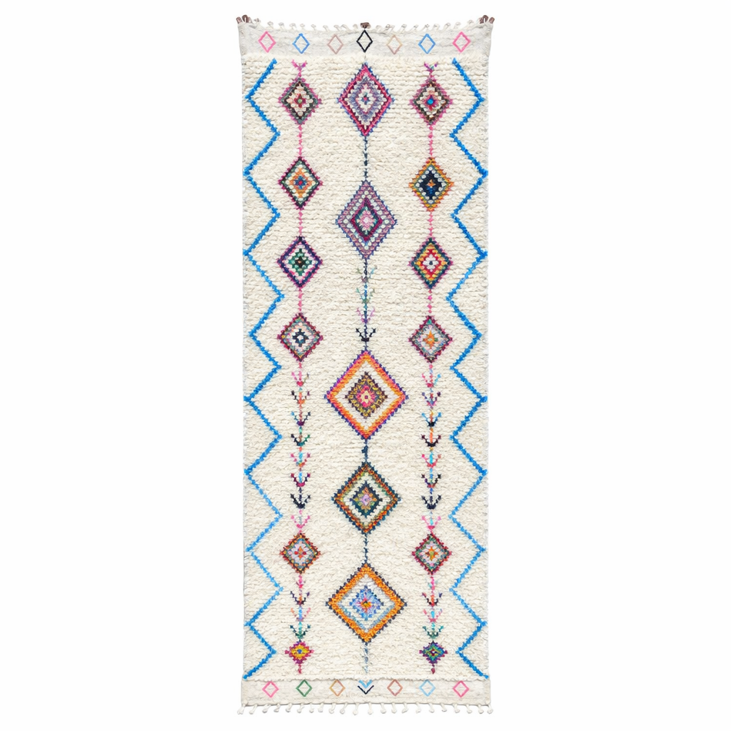 Handmade Moroccan Berber runner rug with colorful diamond and zigzag patterns on white wool
