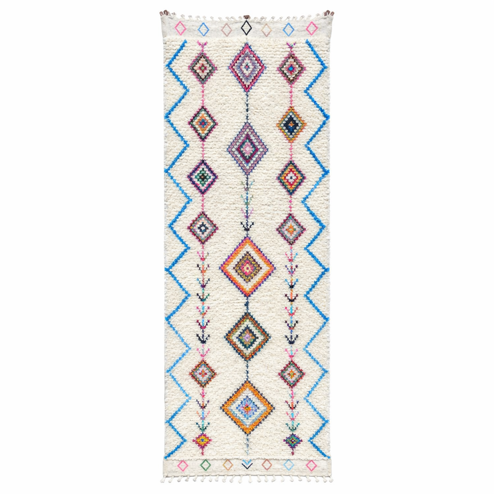Handmade Moroccan Berber runner rug with colorful diamond and zigzag patterns on white wool