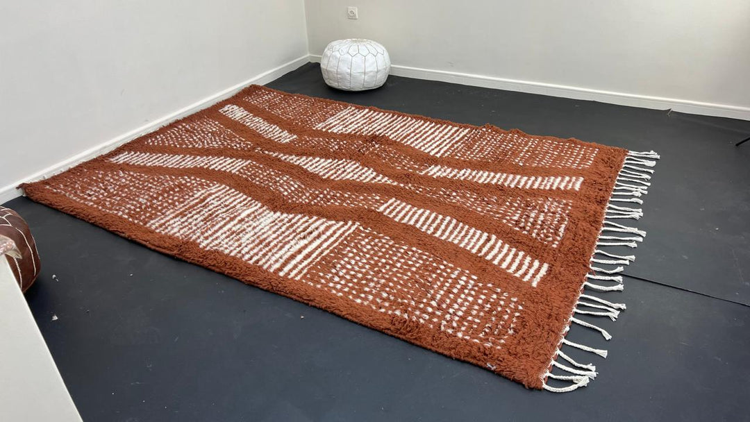 Brown Moroccan handmade wool rug with raised white texture