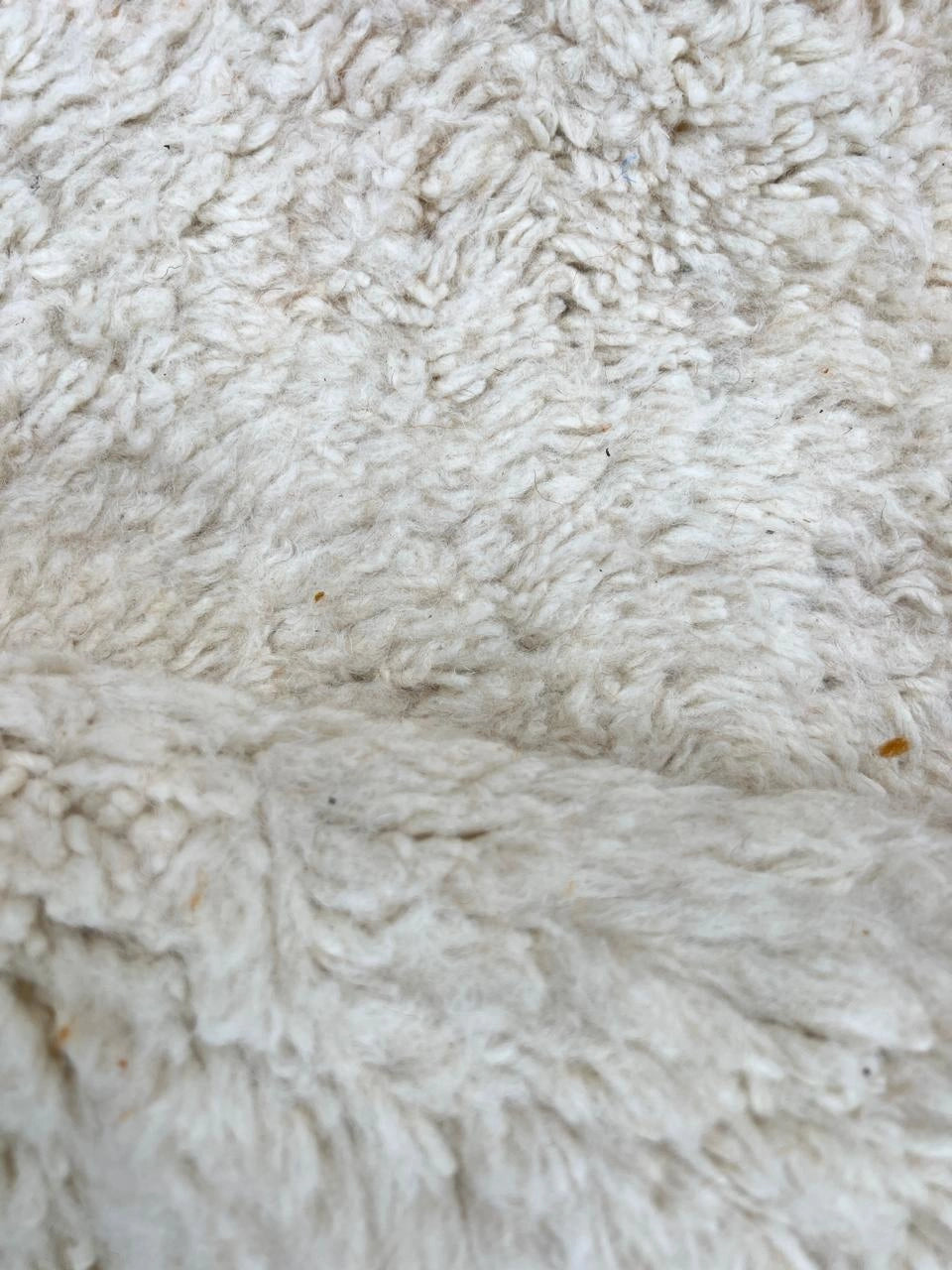 Handmade brown and white Moroccan shag runner rug with modern color-block design, thick wool pile, soft texture, and Berber-style craftsmanship for hallway or narrow spaces