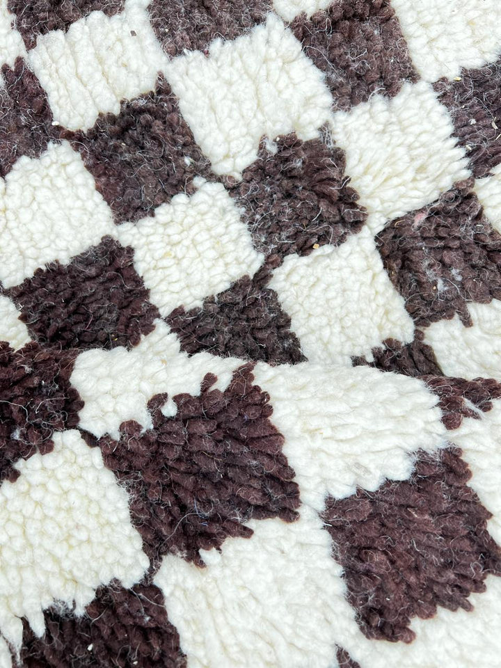 Brown and white checkered Moroccan wool rug, handmade flatweave design with geometric pattern