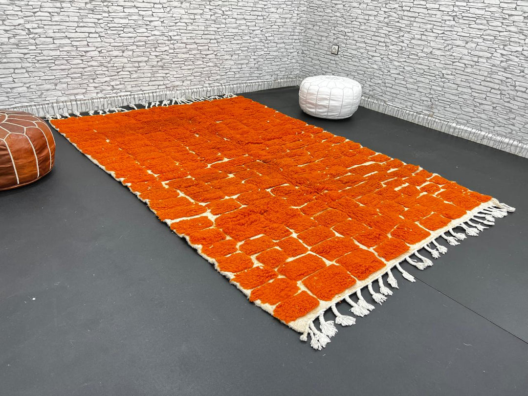 Handmade burnt orange Moroccan wool rug with ivory checkerboard pattern – Beni Mrirt design
