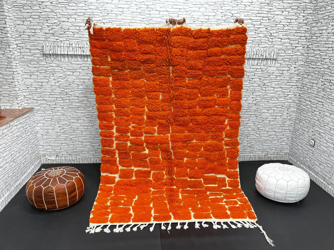 Handmade burnt orange Moroccan wool rug with ivory checkerboard pattern – Beni Mrirt design