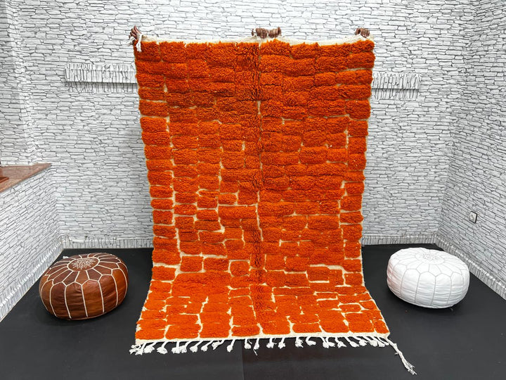 Handmade burnt orange Moroccan wool rug with ivory checkerboard pattern – Beni Mrirt design