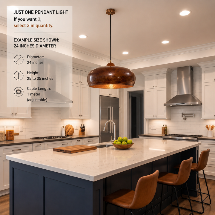 A modern kitchen interior showing a large copper pendant light hanging over a white island with bar stools. Text on the left explains the example size and cable length for the pendant light.