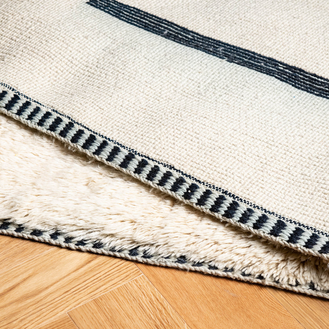 Classic Minimal Beni Mrirt Rug – Handwoven Cream Moroccan Wool Carpet