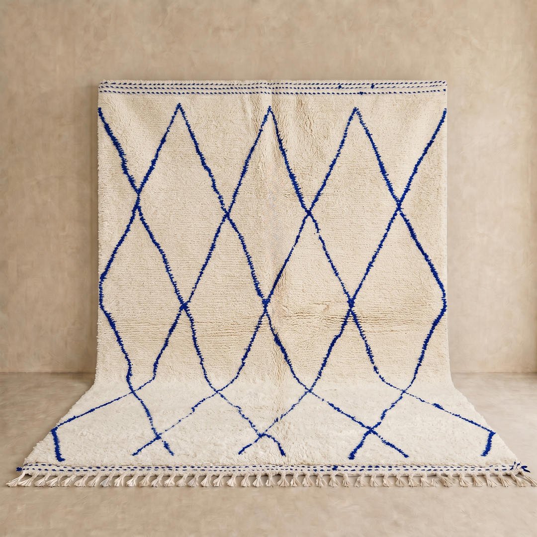 Ivory Moroccan wool rug with cobalt blue diamond lattice handmade by Berber artisans