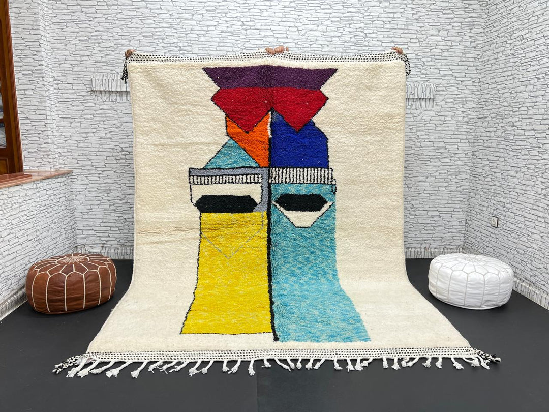 Handwoven Moroccan wool rug with bold geometric color blocks in blue, yellow, and red