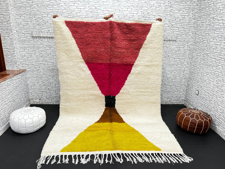 Handmade Moroccan wool rug in red, pink, mustard yellow, and cream – geometric Berber design