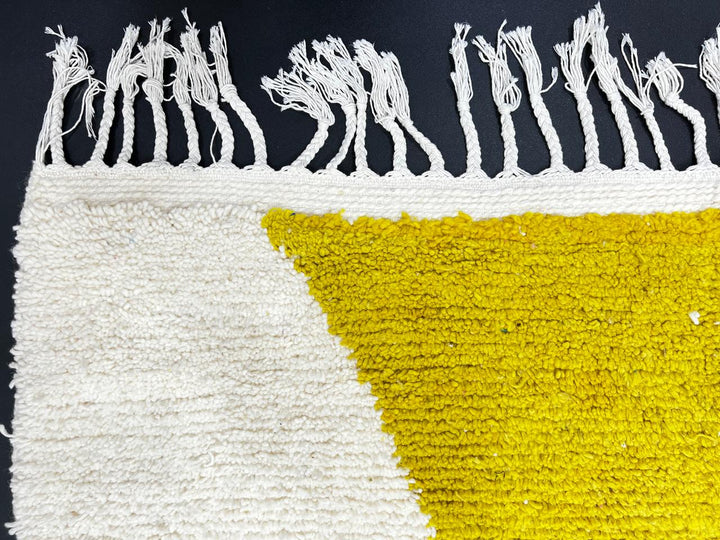 Handmade Moroccan wool rug in red, pink, mustard yellow, and cream – geometric Berber design