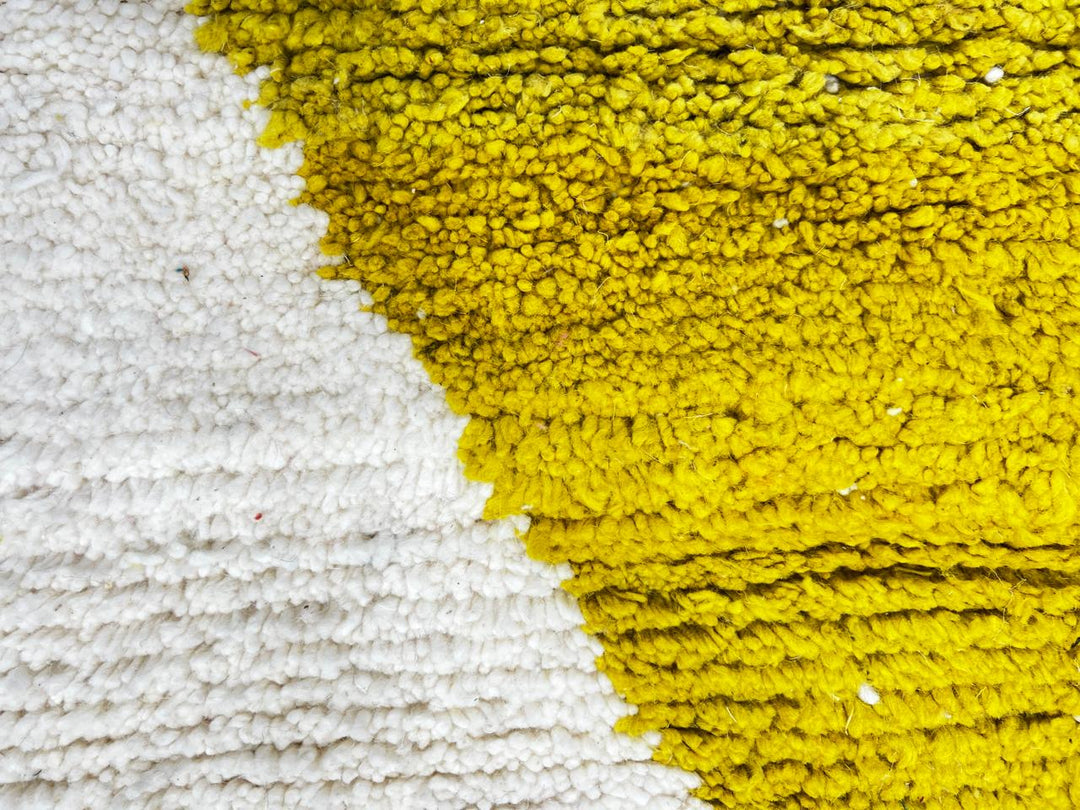 Handmade Moroccan wool rug in red, pink, mustard yellow, and cream – geometric Berber design