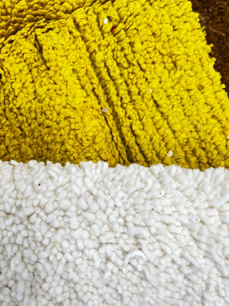 Handmade Moroccan wool rug in red, pink, mustard yellow, and cream – geometric Berber design