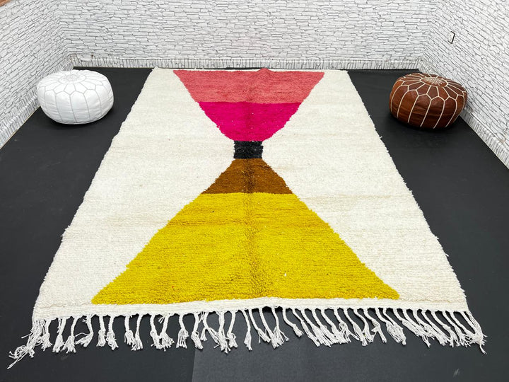 Handmade Moroccan wool rug in red, pink, mustard yellow, and cream – geometric Berber design