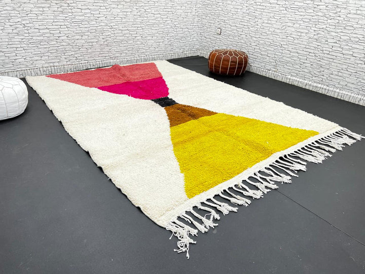 Handmade Moroccan wool rug in red, pink, mustard yellow, and cream – geometric Berber design