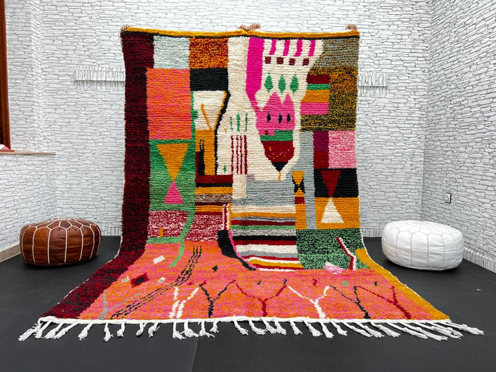 Colorful Moroccan wool rug handmade with coral pink, green, and mustard geometric patterns