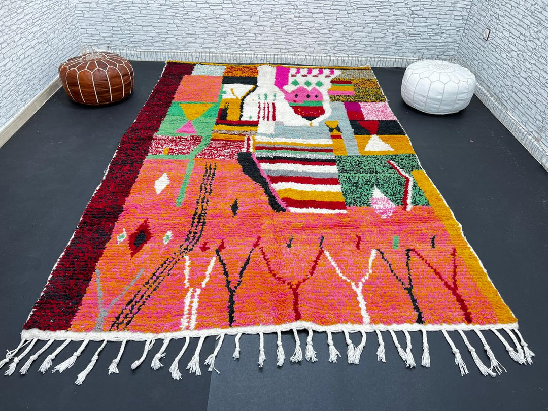 Colorful Moroccan wool rug handmade with coral pink, green, and mustard geometric patterns