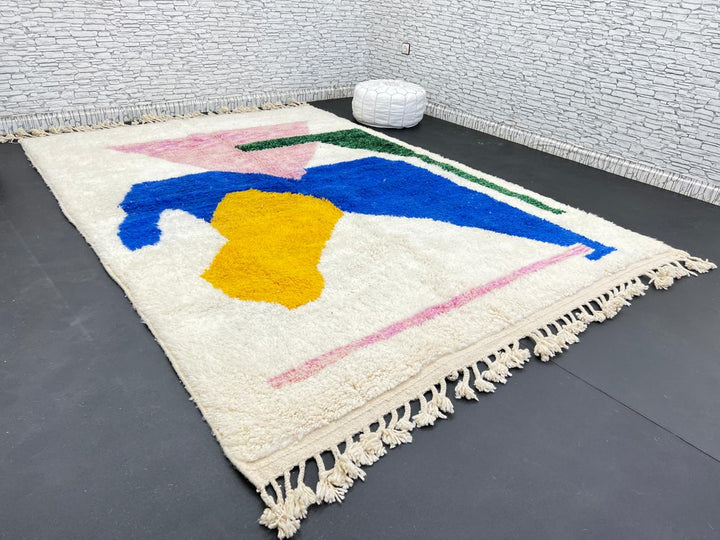 Colorful abstract Moroccan wool rug with pink, blue, yellow, and green geometric design