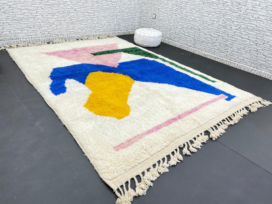 Colorful abstract Moroccan wool rug with pink, blue, yellow, and green geometric design