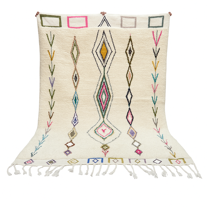 Handmade Moroccan Beni Ourain wool rug with colorful geometric diamond patterns on ivory background