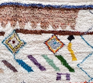 Boho Berber Moroccan runner rug handmade from wool with colorful tribal diamond motifs