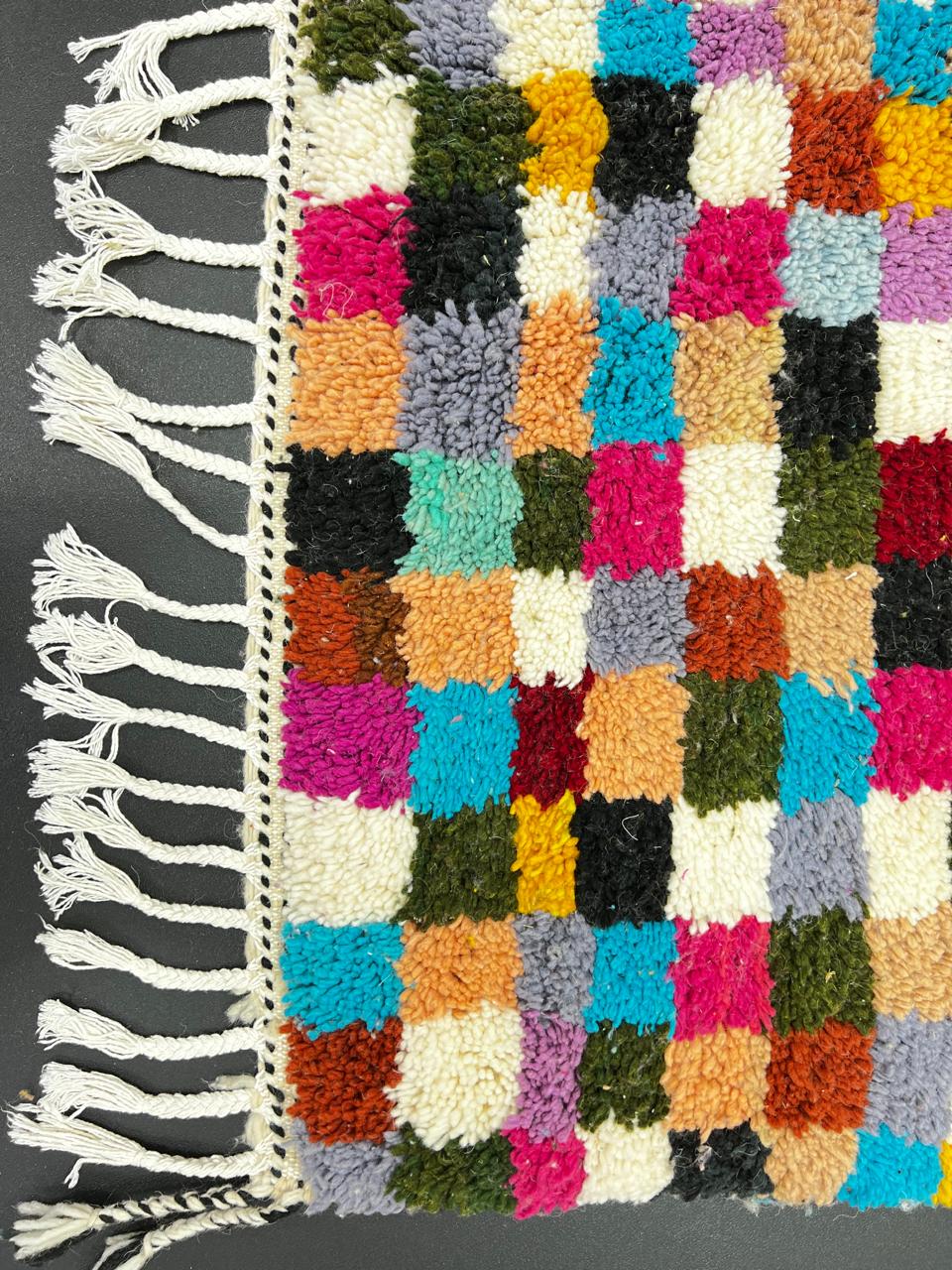 Handmade colorful Moroccan runner rug with multicolor checkerboard geometric design in wool, ideal for modern boho hallway interiors.