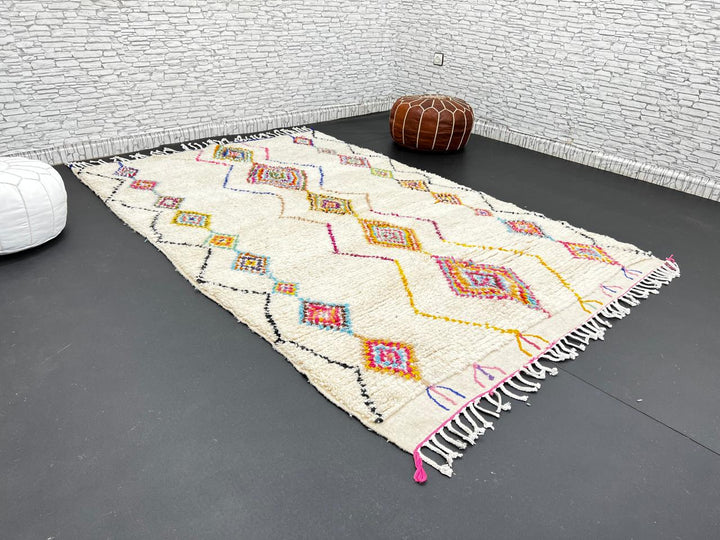 Handmade Moroccan wool rug with colorful diamond patterns on cream background – Berber boho carpet