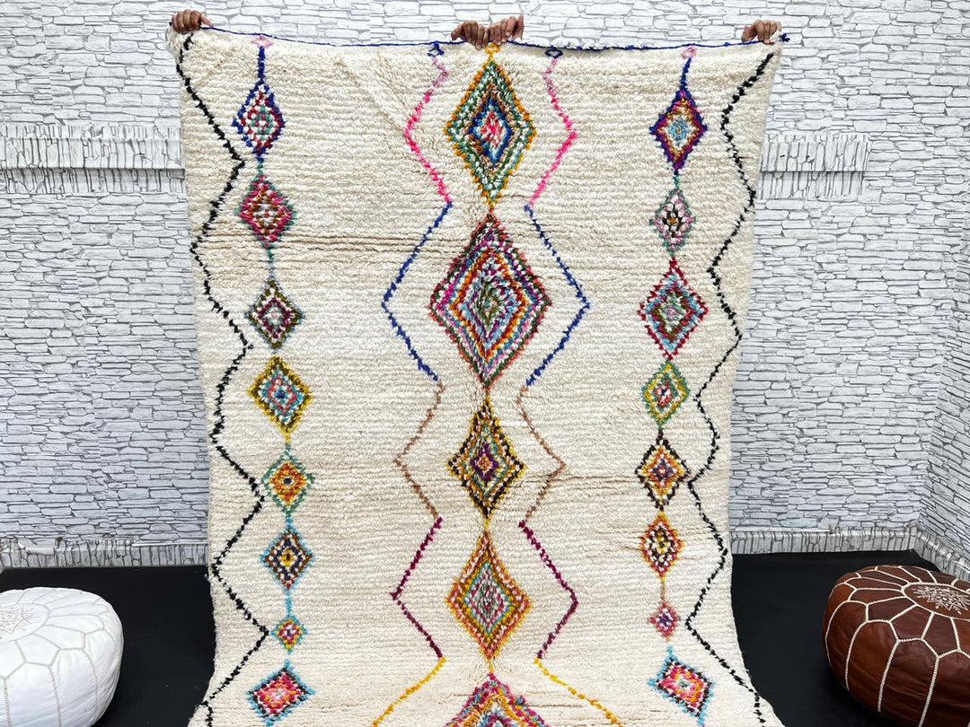 Handmade Moroccan wool rug with colorful diamond patterns on cream background – Berber boho carpet