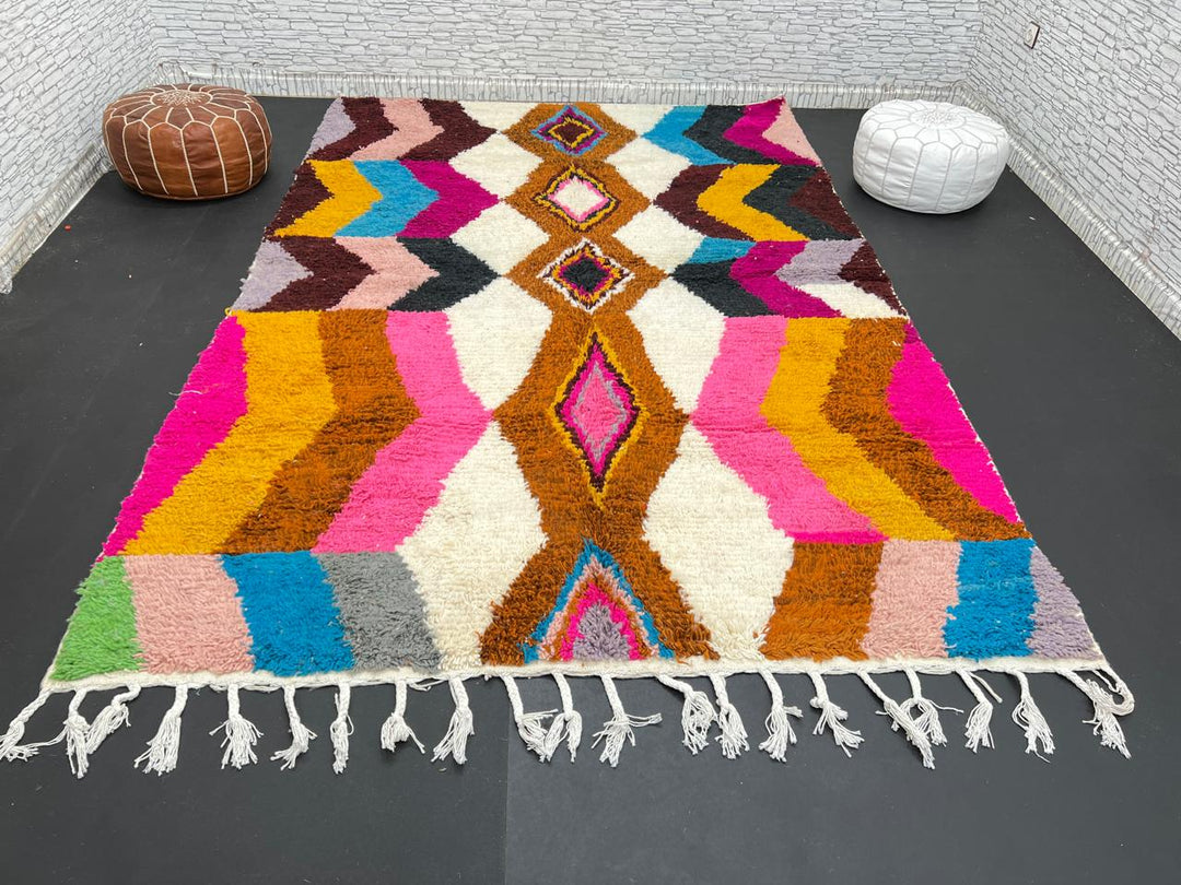 Colorful Moroccan Azilal wool rug with geometric diamond pattern in vibrant hues