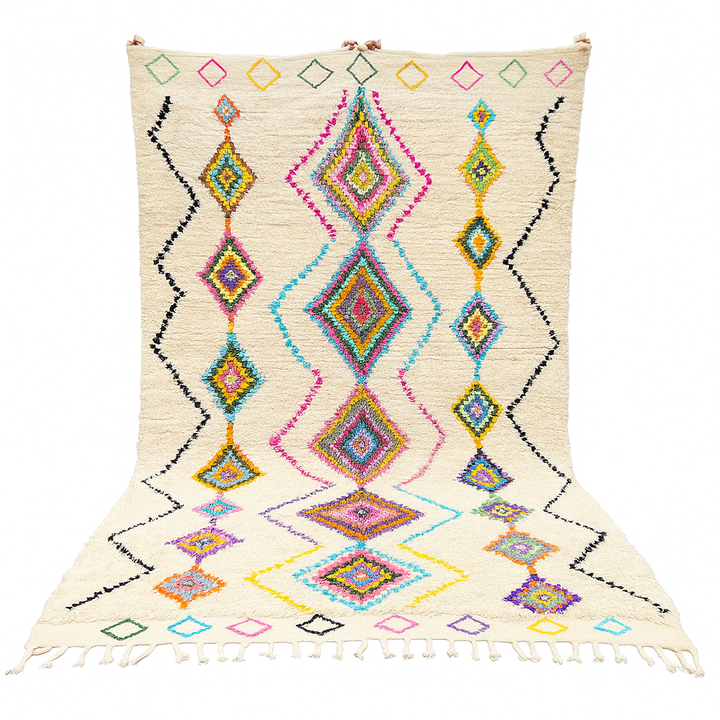 Colorful handmade Moroccan Berber wool rug with vibrant diamond patterns on ivory background