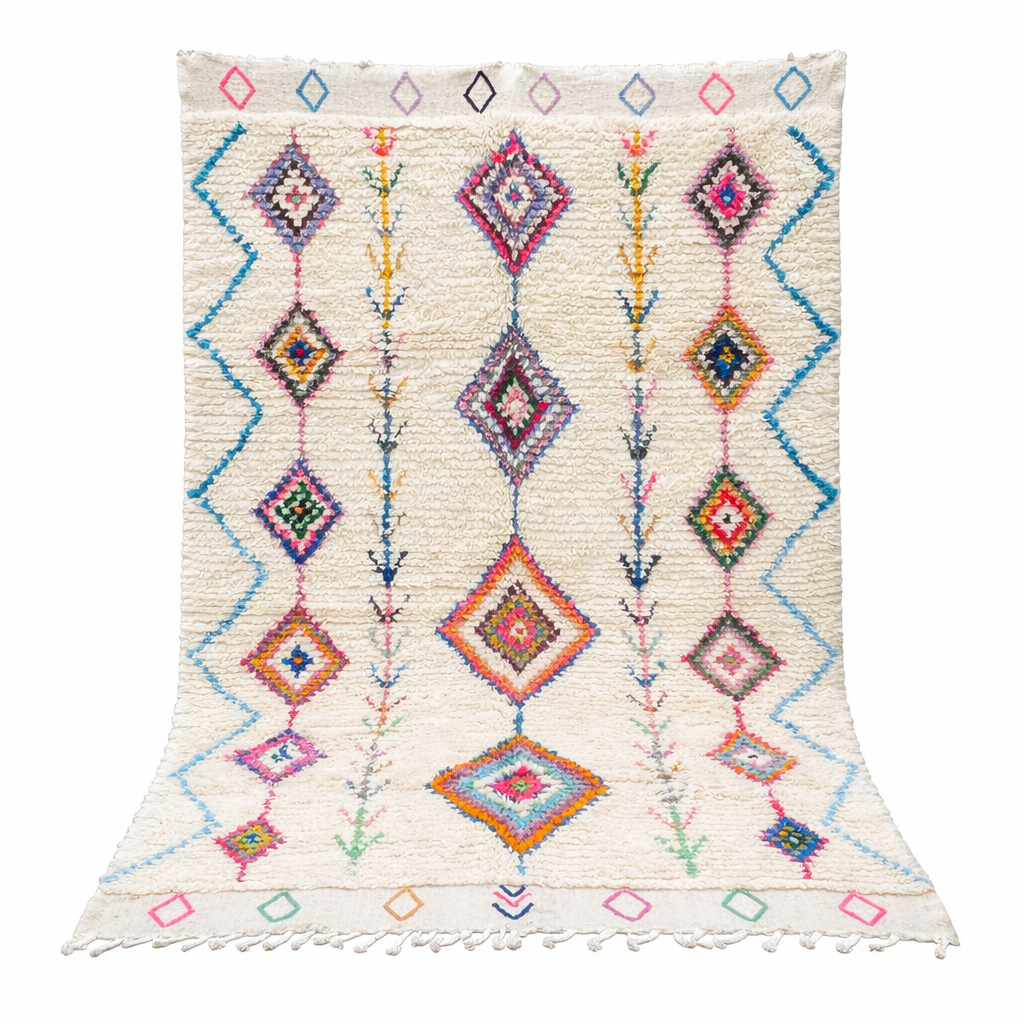 Handmade Moroccan Berber rug with colorful diamond patterns on white wool