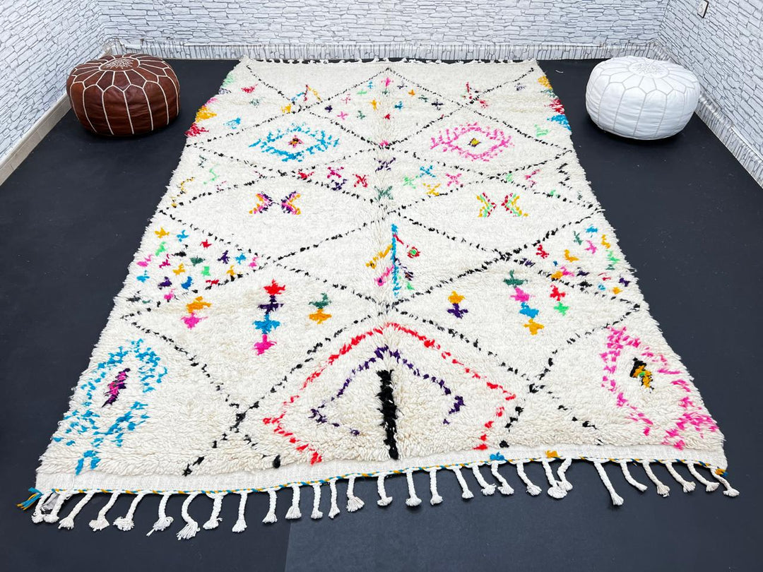 Colorful Moroccan wool rug with multicolor geometric diamond patterns, handmade by Berber artisans