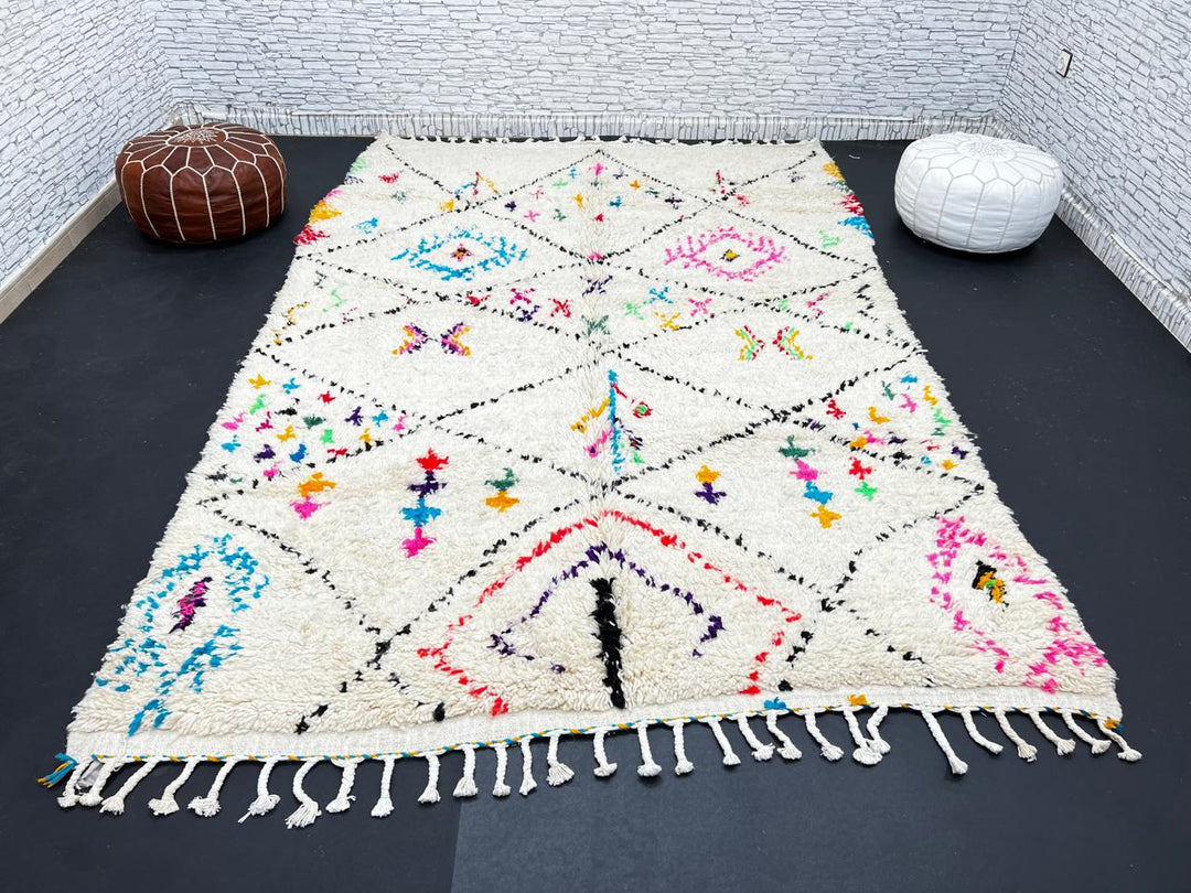 Colorful Moroccan wool rug with multicolor geometric diamond patterns, handmade by Berber artisans