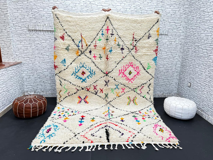 Colorful Moroccan wool rug with multicolor geometric diamond patterns, handmade by Berber artisans