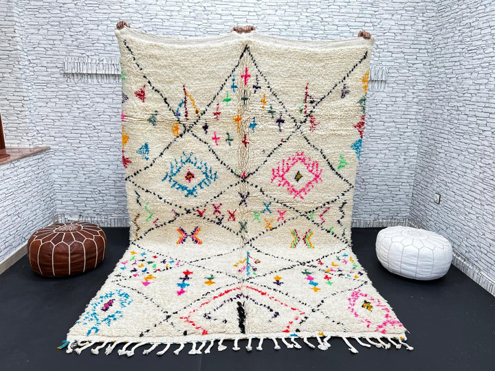 Colorful Moroccan wool rug with multicolor geometric diamond patterns, handmade by Berber artisans