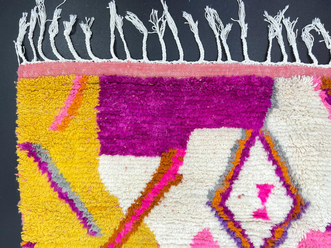 Handwoven colorful Moroccan wool runner rug with abstract diamond pattern