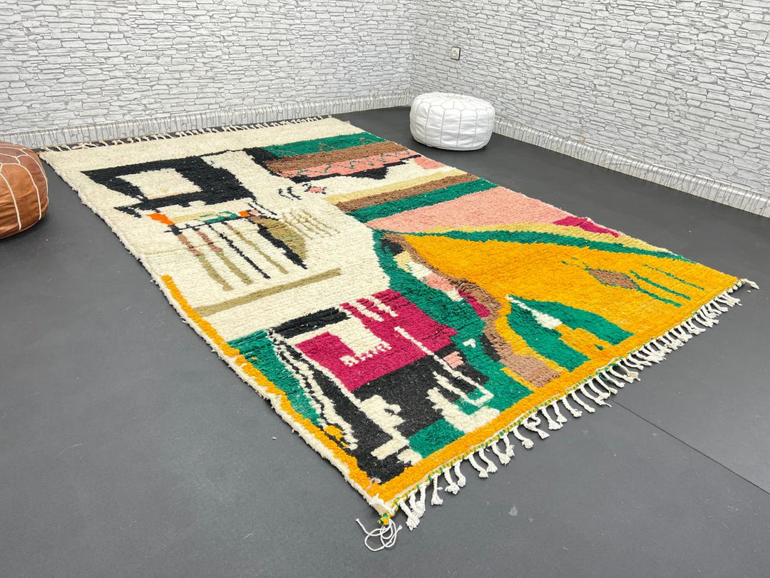 Handwoven colorful Moroccan wool rug with abstract geometric design in pink, yellow, green, and black tones