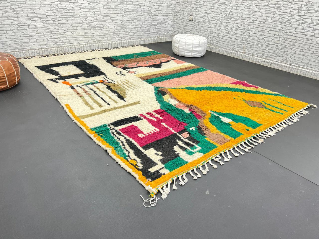 Handwoven colorful Moroccan wool rug with abstract geometric design in pink, yellow, green, and black tones