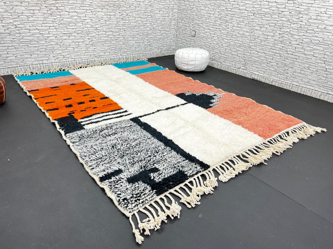 Colorful Moroccan wool rug with terracotta, turquoise blue, ivory, orange, and gray geometric color blocks