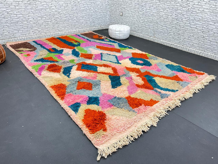 Colorful Moroccan wool rug with abstract geometric design in vibrant shades